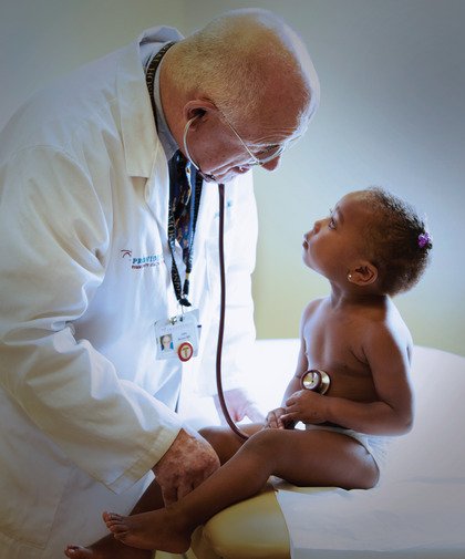 Dr. John Moran with small kid