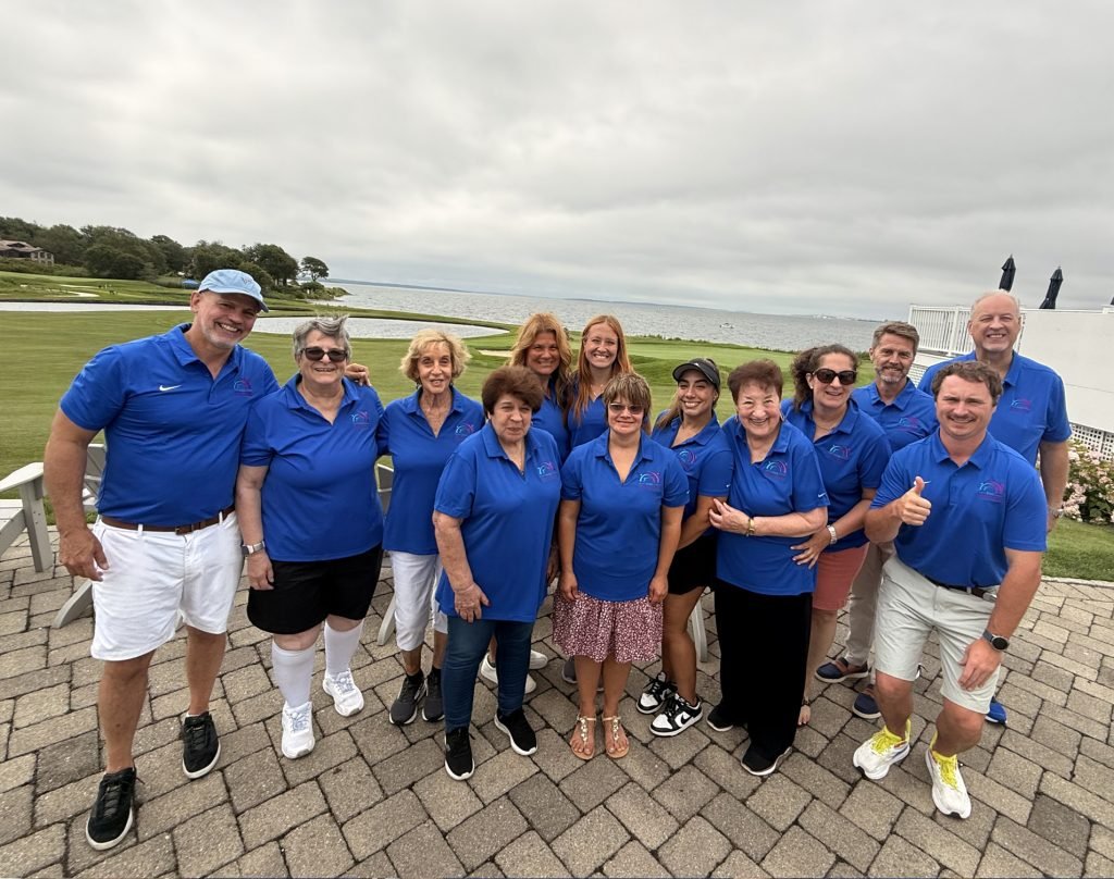 Photo of team annual golf tournament