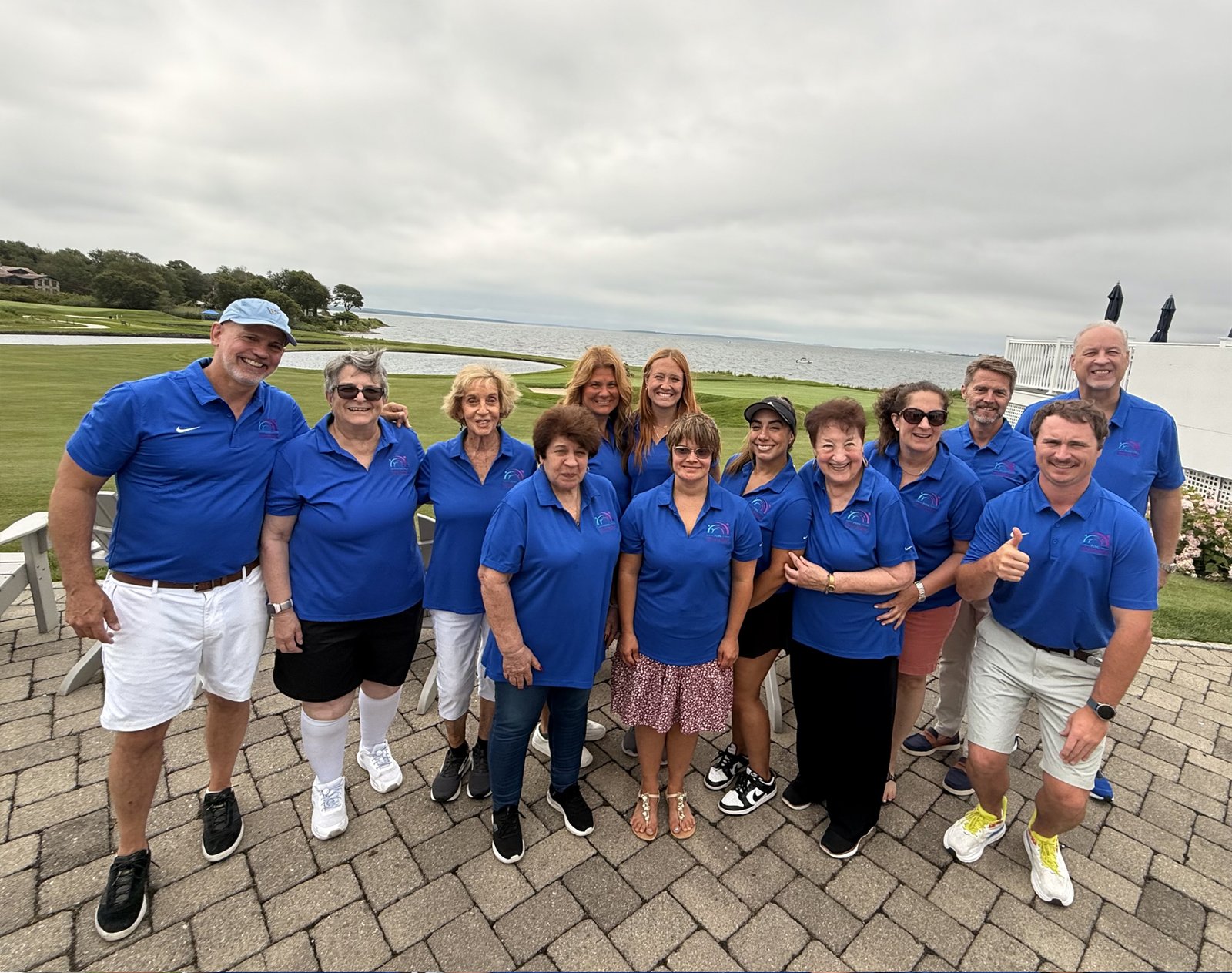 Photo of team annual golf tournament