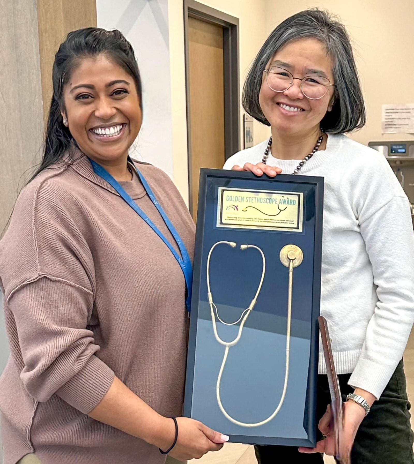 Photo of Dr. Karen Ng recognized for clinical excellence with the Golden Stethoscope Award